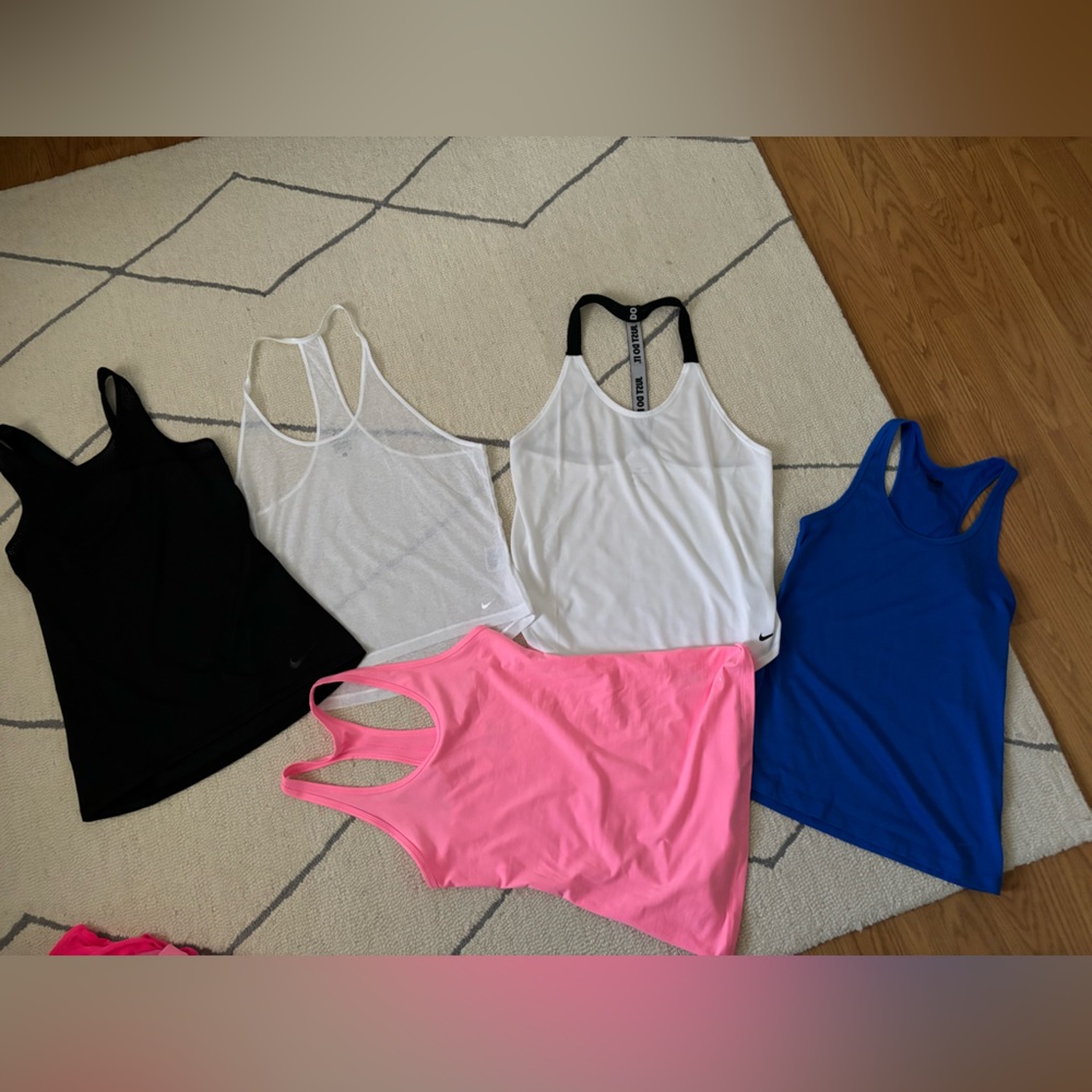 All 5 Nike Tank Tops and all smalls